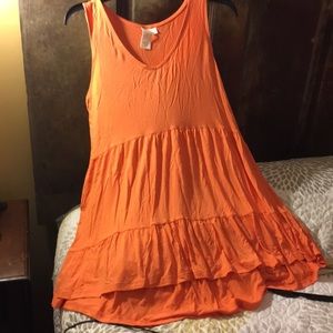 Ady P orange sleeveless tiered tank top.
